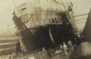 LST327_damaged_by_mine,_Plymouth.jpg